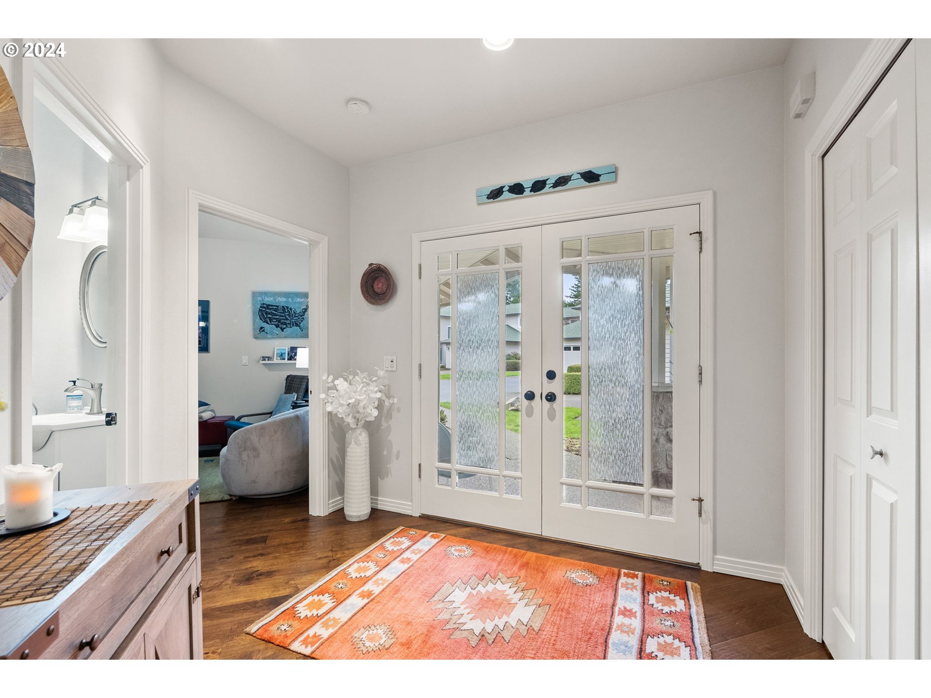22225 Chelan Loop West Linn, OR 97068 - Photo 6 of 46 a living room with furniture and a rug