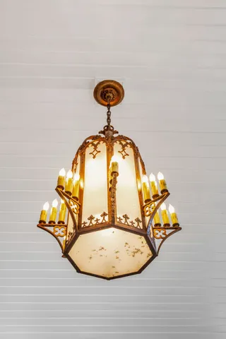 a view of an empty room with a iron stairs