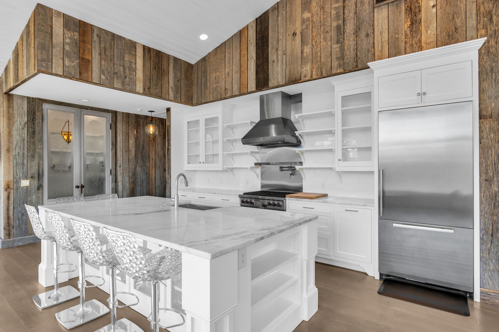 2942 Spanntown Road Arrington, TN 37014 - Photo 49 of 94 a kitchen with stainless steel appliances granite countertop a sink and a refrigerator