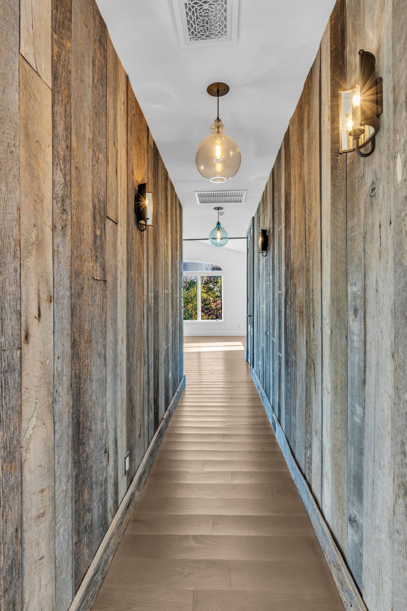 2942 Spanntown Road Arrington, TN 37014 - Photo 61 of 94 a view of a hallway with wooden floor and staircase