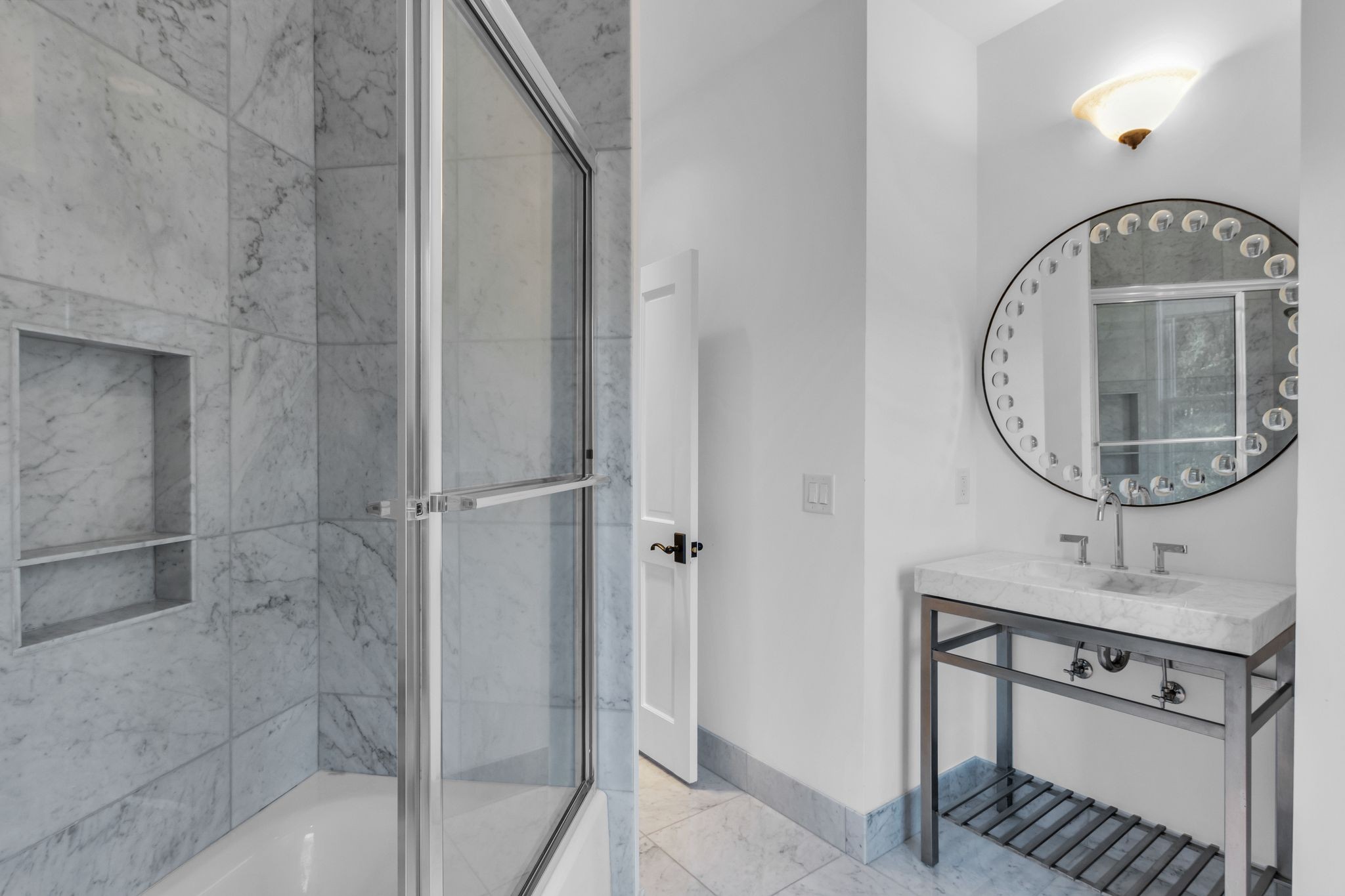 2942 Spanntown Road Arrington, TN 37014 - Photo 65 of 94 a bathroom with a sink a mirror and a shower