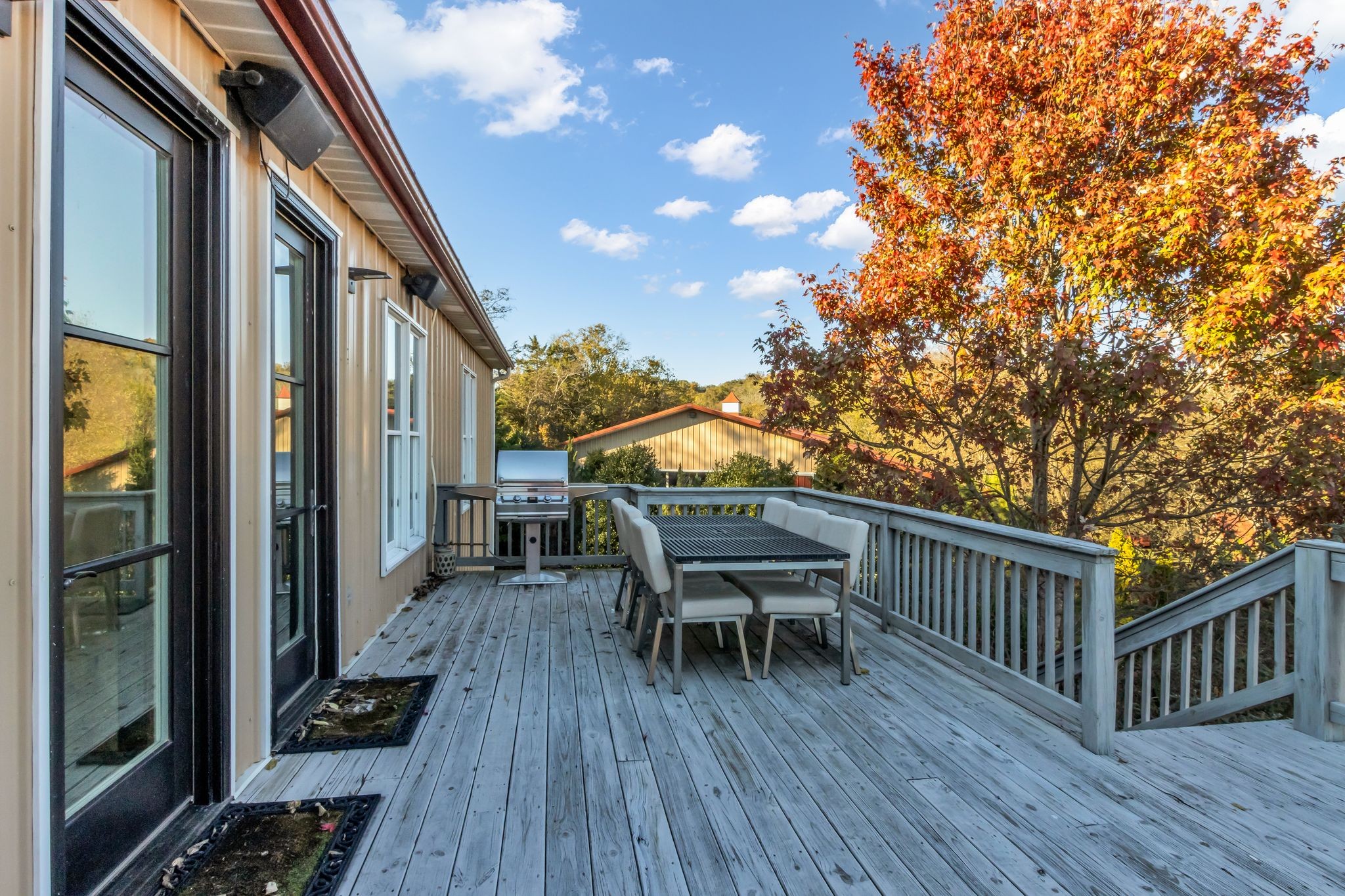 2942 Spanntown Road Arrington, TN 37014 - Photo 72 of 94 a balcony with wooden floor and outdoor seating