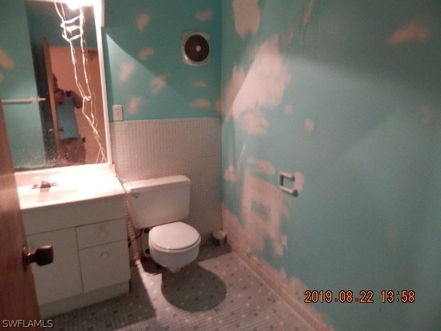 31600 Bermont Road Punta Gorda, FL 33982 - Photo 5 of 23 a bathroom with a sink and a toilet