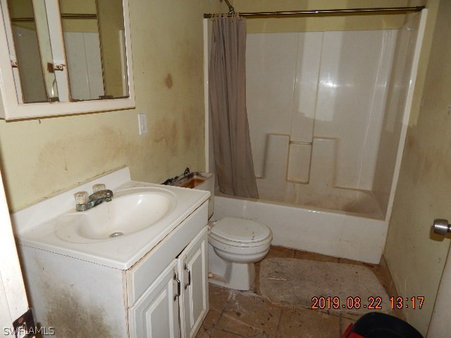 31600 Bermont Road Punta Gorda, FL 33982 - Photo 10 of 23 a bathroom with a sink toilet and shower