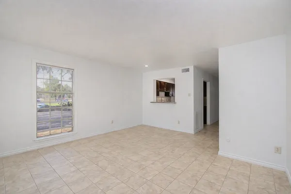 an empty room with windows