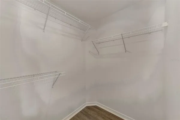 a view of a room with racks on the wall