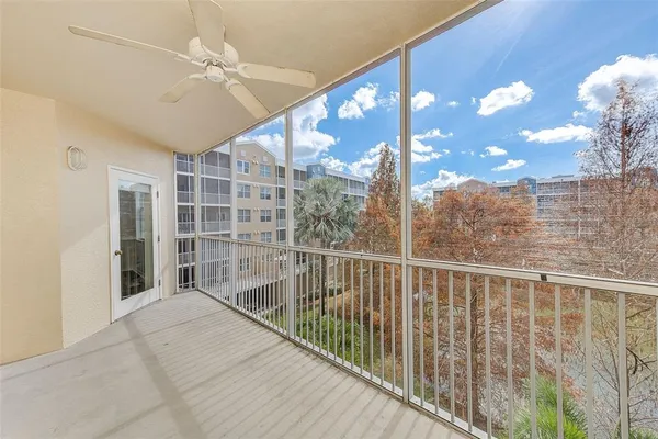 a view of a porch with a floor to ceiling window