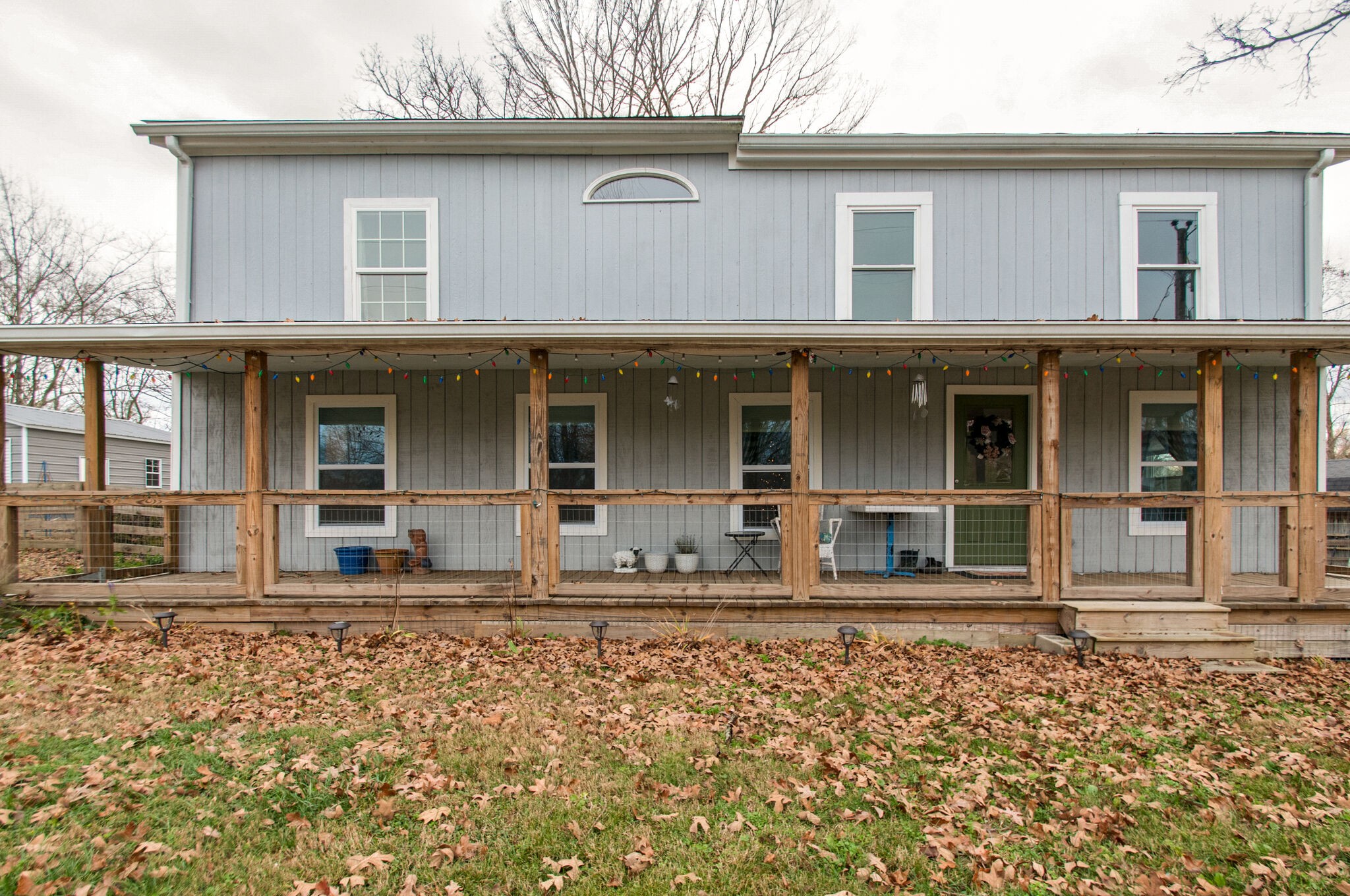 7377 Taylor Road Fairview, TN 37062 - Photo 1 of 22 a front view of a house with a garden