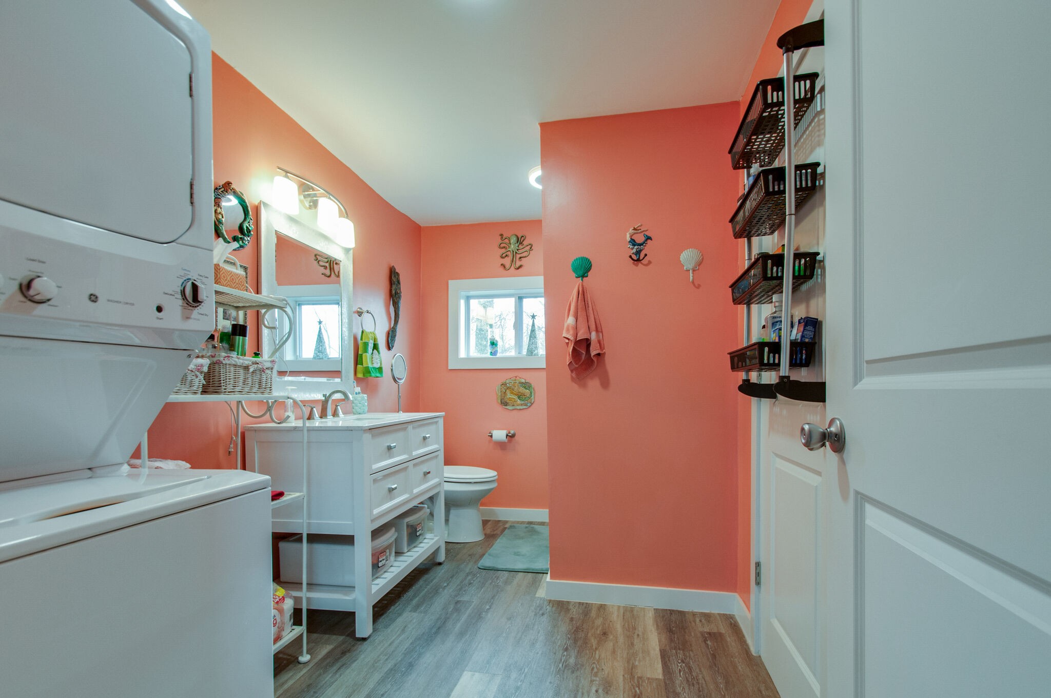 7377 Taylor Road Fairview, TN 37062 - Photo 15 of 22 walk in closet with wooden floor washer and dryer
