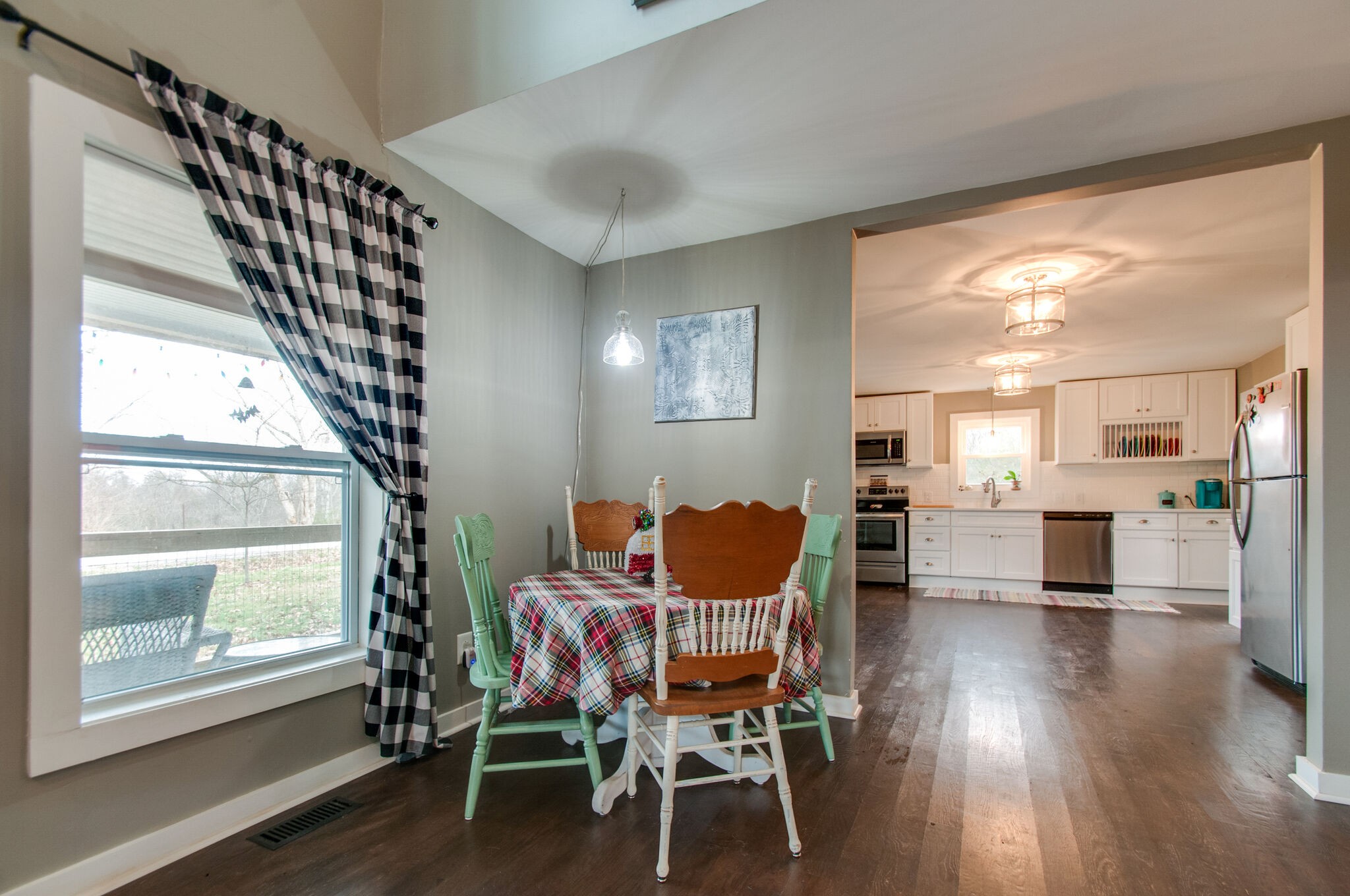 7377 Taylor Road Fairview, TN 37062 - Photo 18 of 22 a dining room with furniture and wooden floor