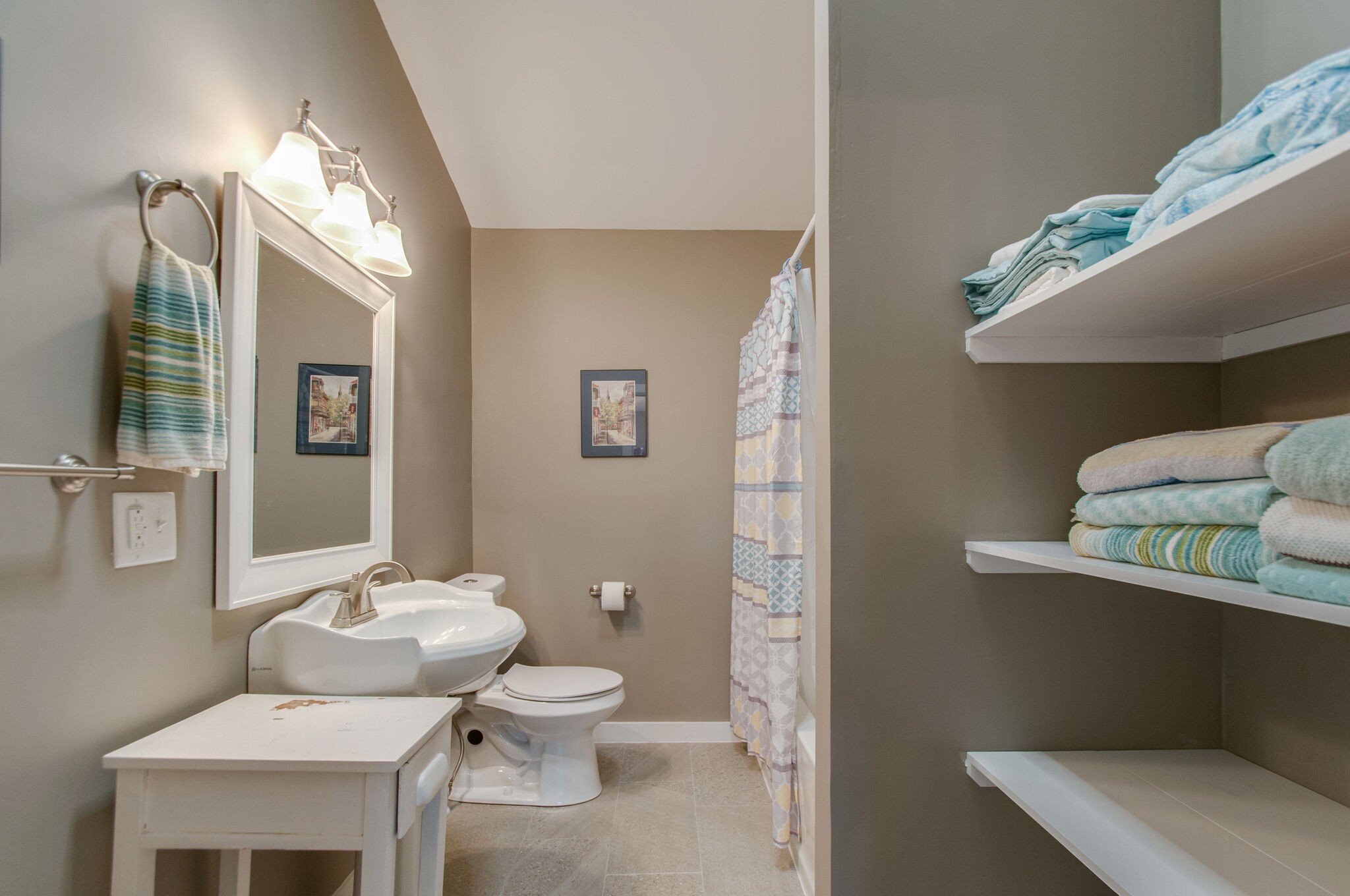 7377 Taylor Road Fairview, TN 37062 - Photo 20 of 22 a white toilet sitting next to a bathroom sink