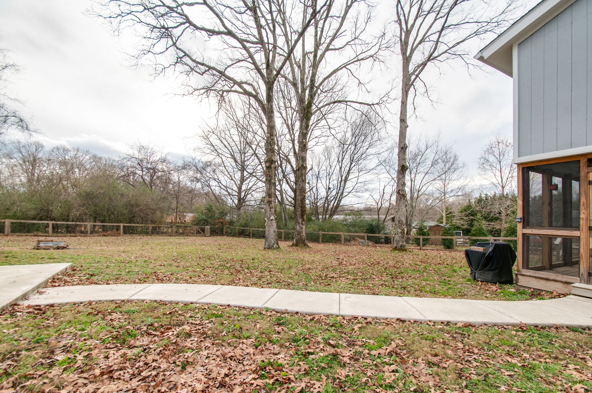 7377 Taylor Road Fairview, TN 37062 - Photo 8 of 22 a view of a yard with a house