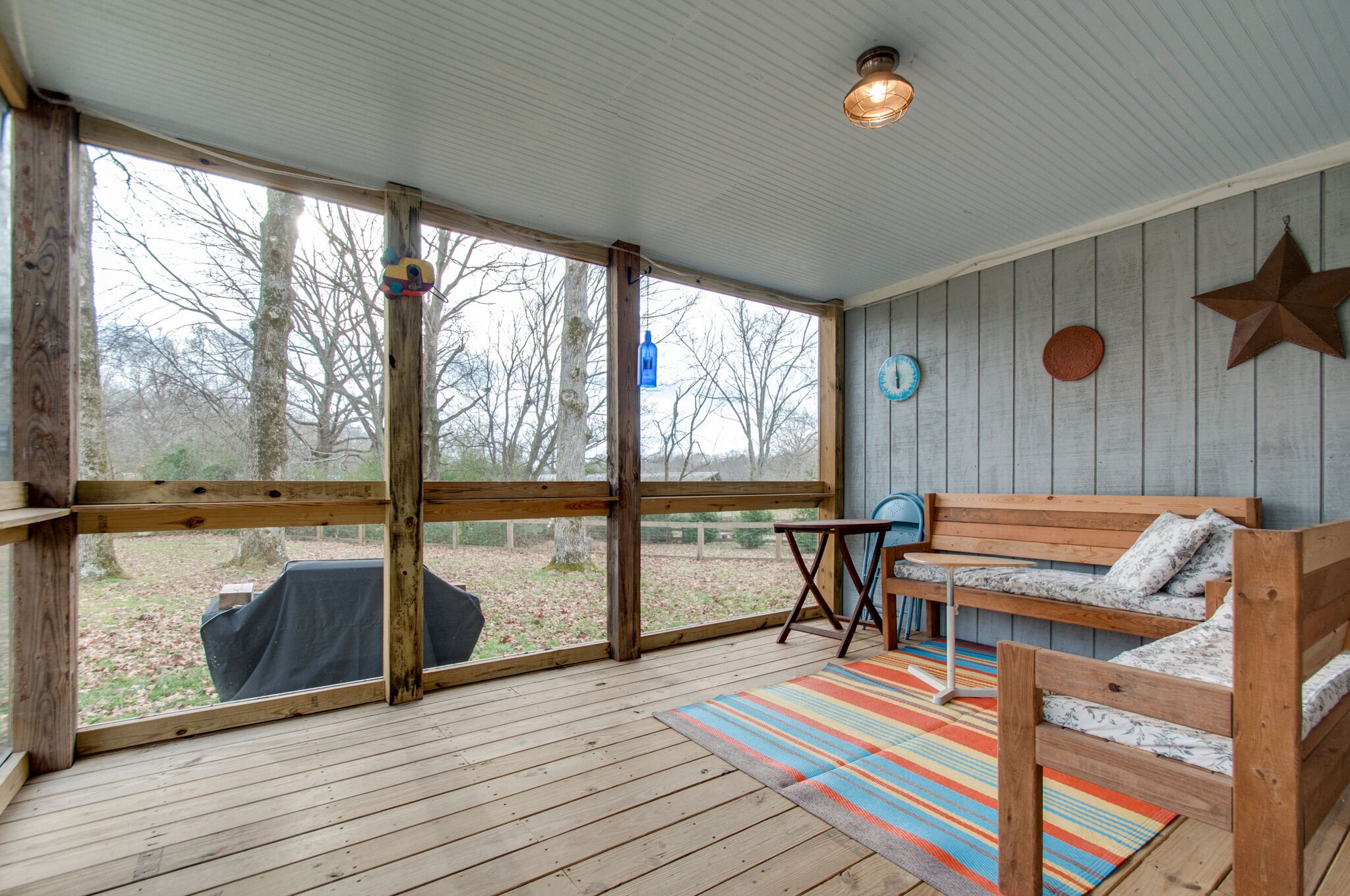 7377 Taylor Road Fairview, TN 37062 - Photo 9 of 22 a balcony with chairs and wooden floor