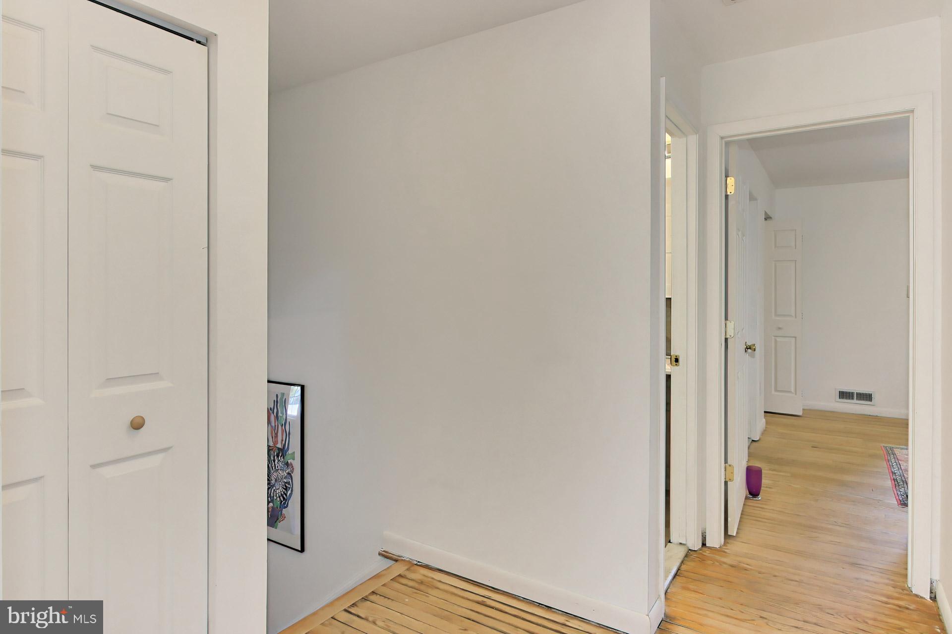 6305 Gormley Place Springfield, VA 22152 - Photo 19 of 66 Upper hallway. Upper level has hardwood floors