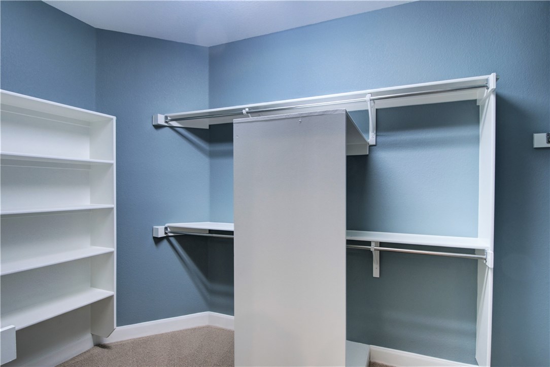 8217 Endeavor Circle Austin, TX 78726 - Photo 24 of 36 a view of an empty walk in closet