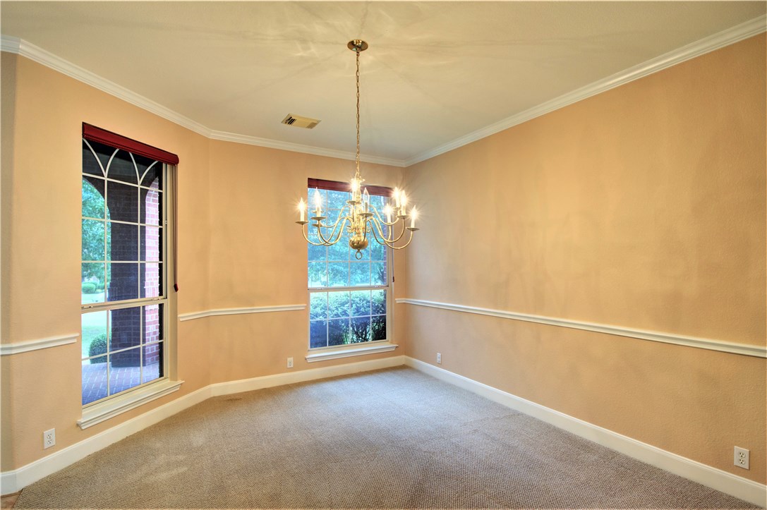 8217 Endeavor Circle Austin, TX 78726 - Photo 6 of 36 a view of an empty room with a window