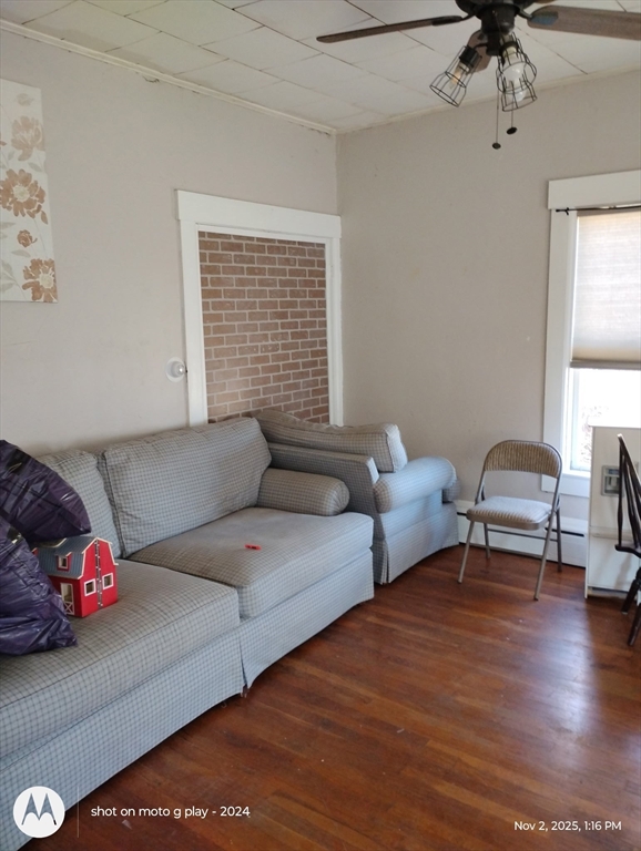 77 West Main Street Ware, MA 01082 - Photo 4 of 17 a living room with furniture and a wooden floor