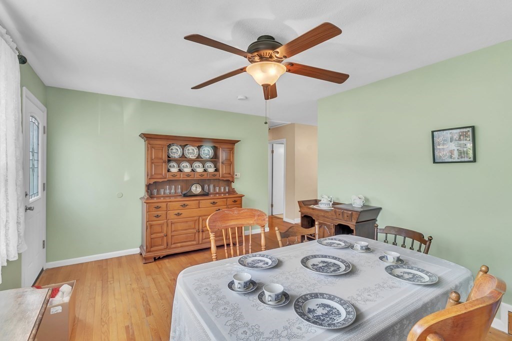 48 Greenlawn Street Springfield, MA 01119 - Photo 20 of 39 a view of a dining room with furniture and wooden floor