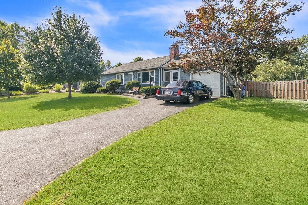 48 Greenlawn Street Springfield, MA 01119 - Photo 2 of 39 a view of a house with backyard and porch