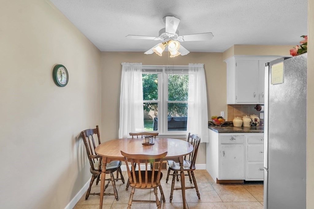 48 Greenlawn Street Springfield, MA 01119 - Photo 21 of 39 a view of a dining room with furniture and chandelier