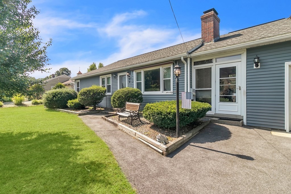 48 Greenlawn Street Springfield, MA 01119 - Photo 27 of 39 a view of a house with backyard and porch