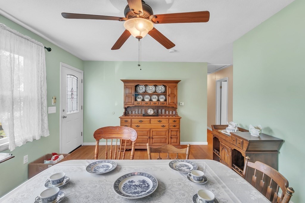 48 Greenlawn Street Springfield, MA 01119 - Photo 29 of 39 a bedroom with a bed and a chandelier