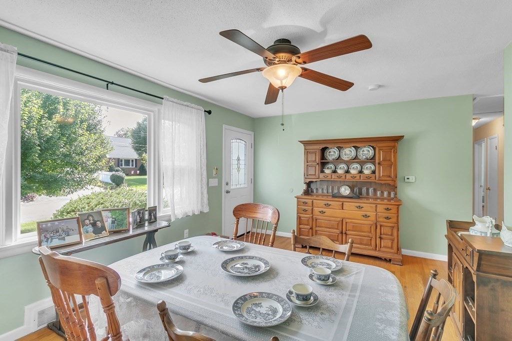 48 Greenlawn Street Springfield, MA 01119 - Photo 3 of 39 a view of a dining room with furniture window and outside view