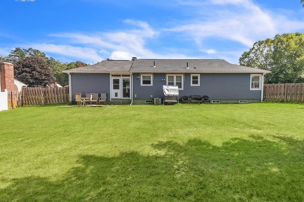 48 Greenlawn Street Springfield, MA 01119 - Photo 35 of 39 a house view with a sitting space and garden