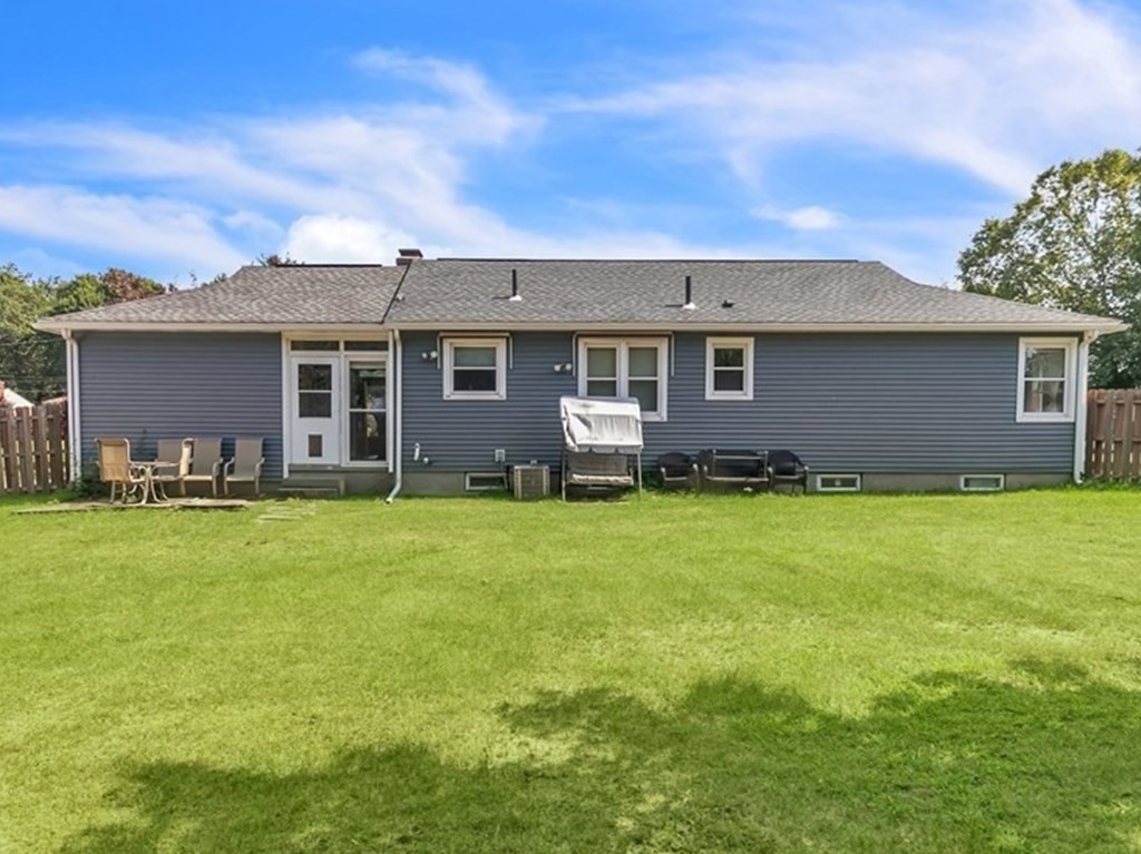 48 Greenlawn Street Springfield, MA 01119 - Photo 36 of 39 a front view of house with yard and porch