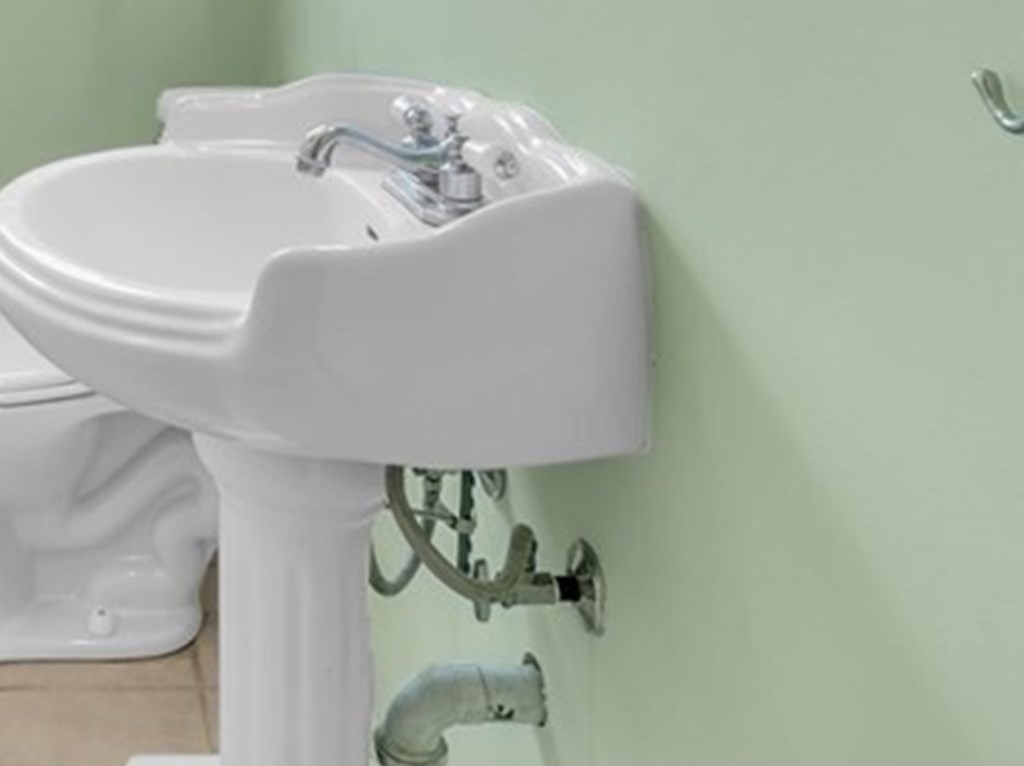 48 Greenlawn Street Springfield, MA 01119 - Photo 37 of 39 a bathroom with a sink and mirror