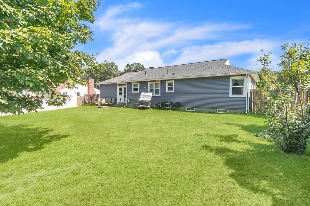 48 Greenlawn Street Springfield, MA 01119 - Photo 10 of 39 a view of a house with a yard