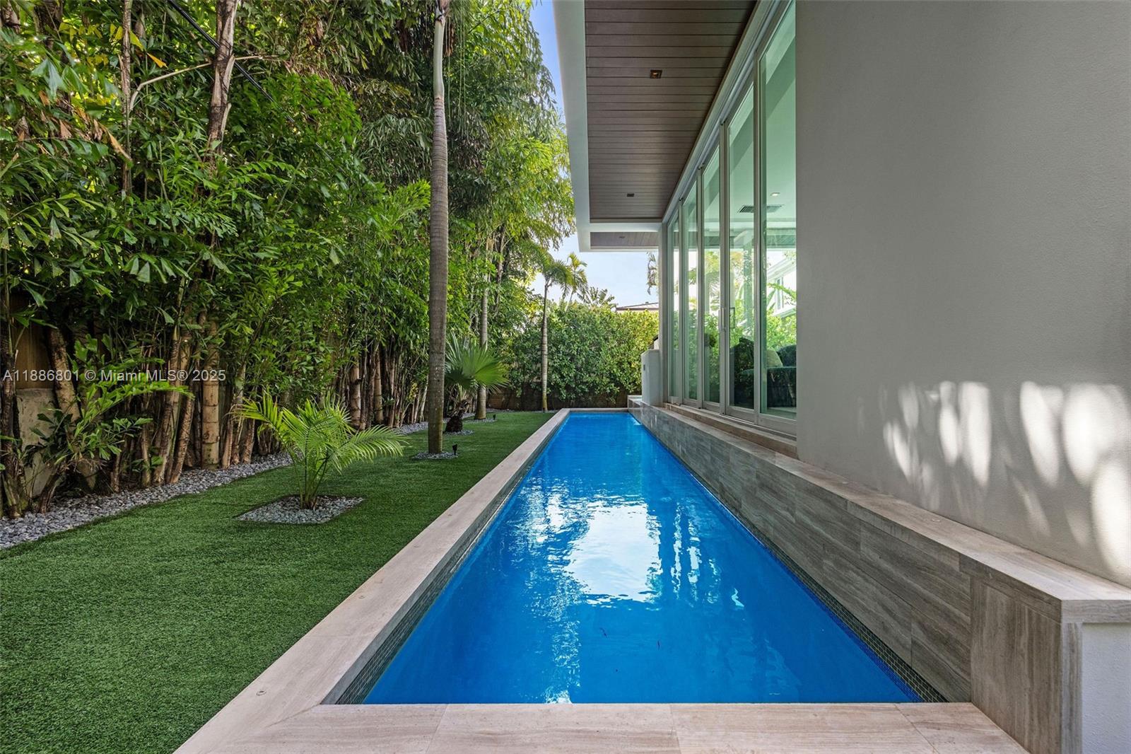 4433 North Bay Road Miami Beach, FL 33140 - Photo 27 of 71 a view of swimming pool from a balcony