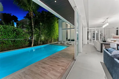 a view of balcony with wooden floor and fence
