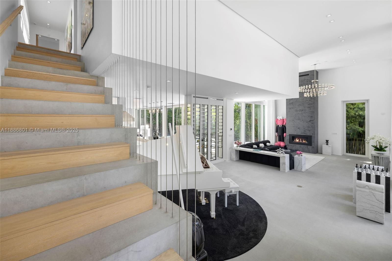 4433 North Bay Road Miami Beach, FL 33140 - Photo 42 of 71 a view of entryway and hall with wooden floor