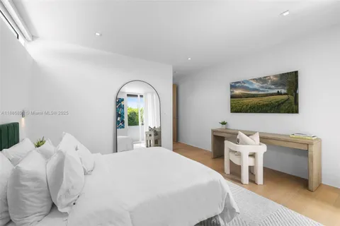 a white bath tub sitting in a bathroom