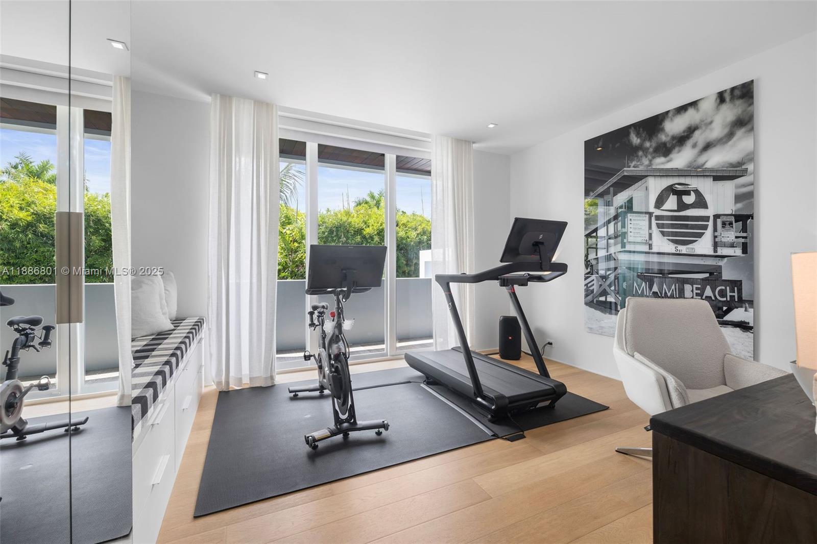 4433 North Bay Road Miami Beach, FL 33140 - Photo 54 of 71 a view of a room with gym equipment