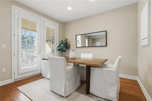 a view of a livingroom with furniture and windows