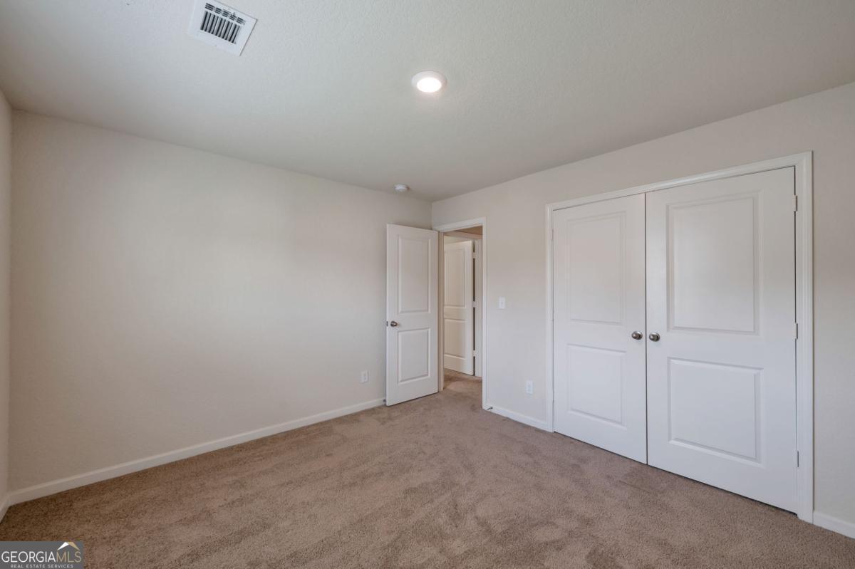 2889 Cleburne Terrace Hampton, GA 30228 - Photo 17 of 25 a view of an empty room
