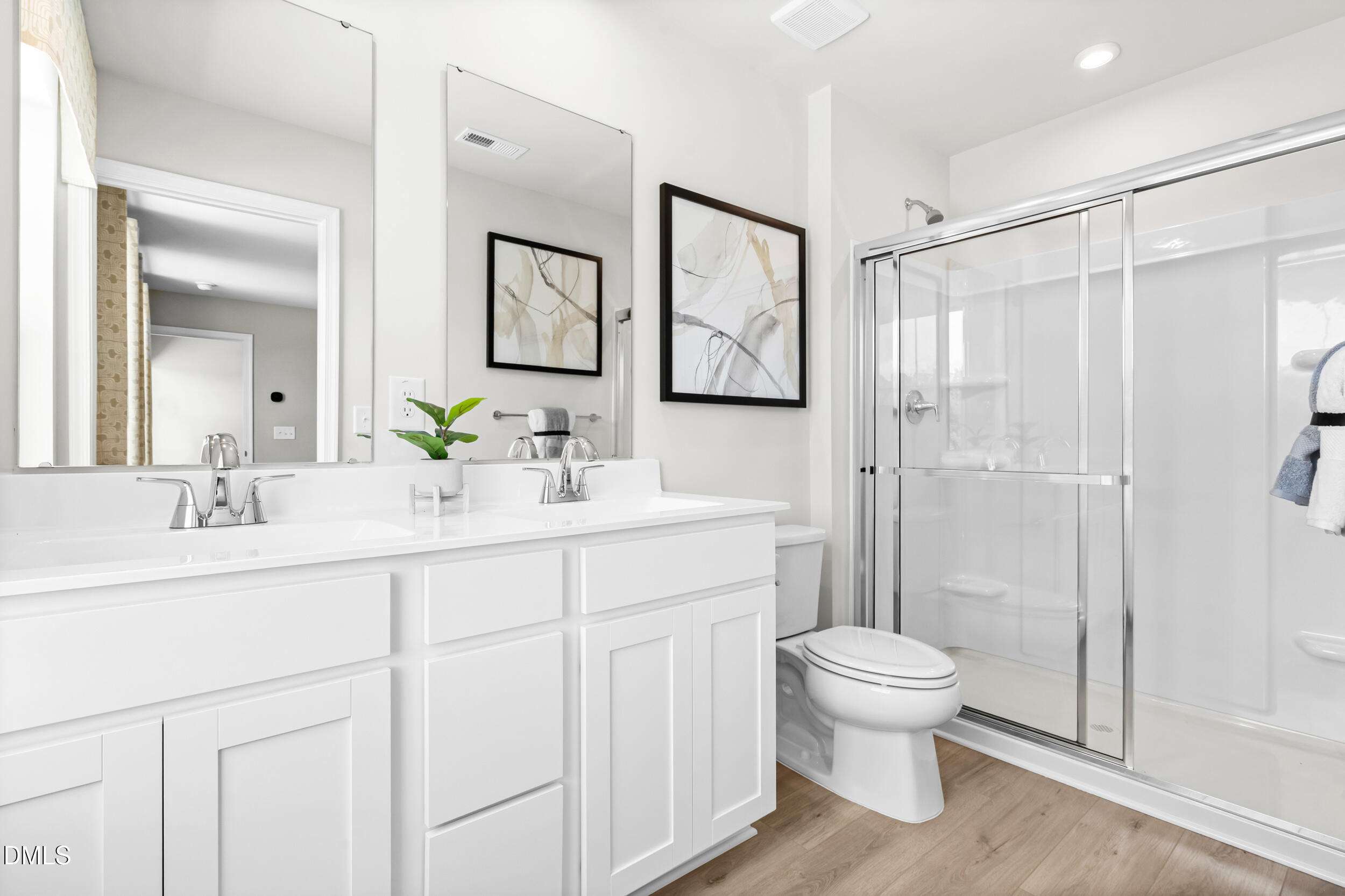 49 Better Day Way Lillington, NC 27546 - Photo 19 of 29 a bathroom with a sink a toilet and shower