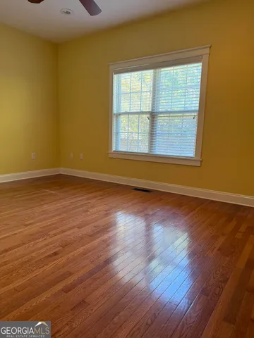 a bathroom with a shower and a toilet