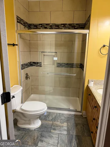 a utility room with sink dryer and washer