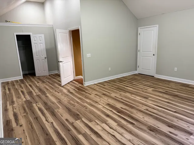 a bathroom with a toilet and a bathtub