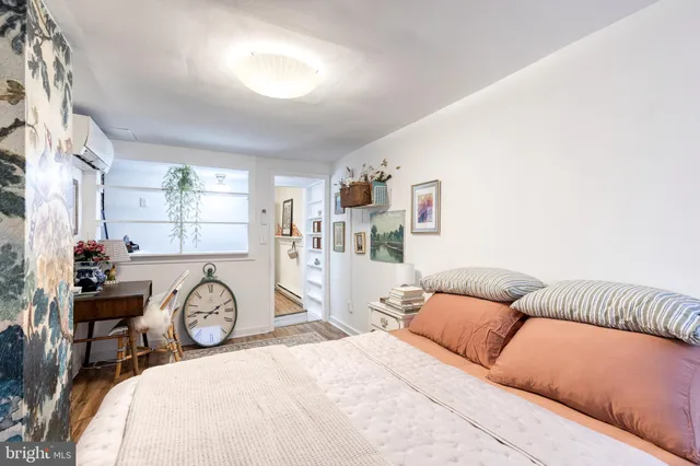 a view of a livingroom with furniture and windows