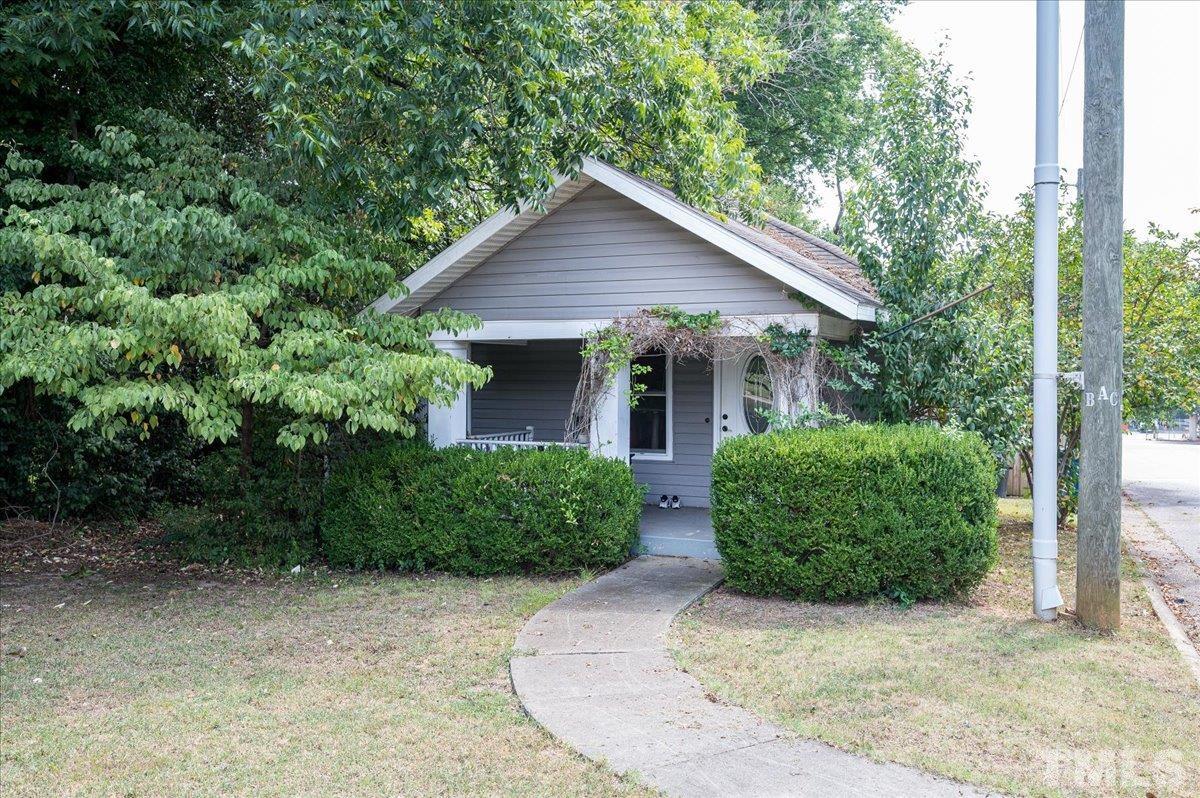 302 Georgetown Road Raleigh, NC 27608 - Photo 2 of 19 front view of a house with a yard