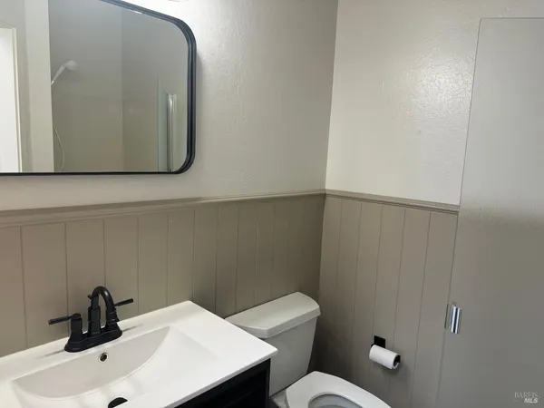 a bathroom with a sink and a toilet