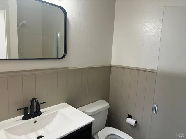 a bathroom with a sink and a toilet