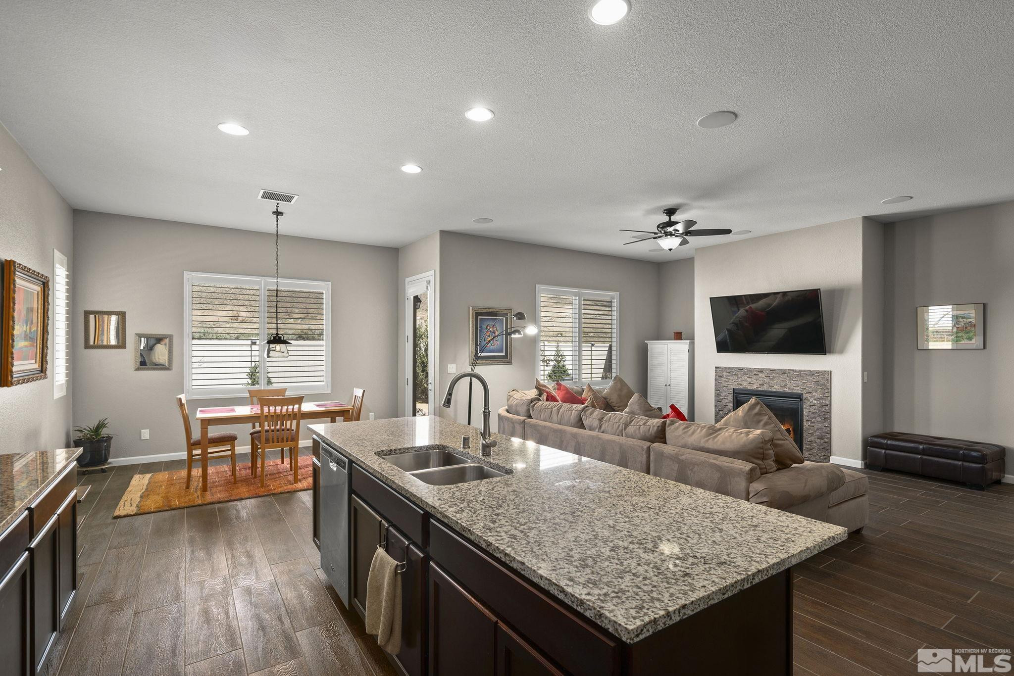2975 Show Jumper Lane Reno, NV 89521 - Photo 11 of 32 a kitchen with granite countertop lots of counter top space