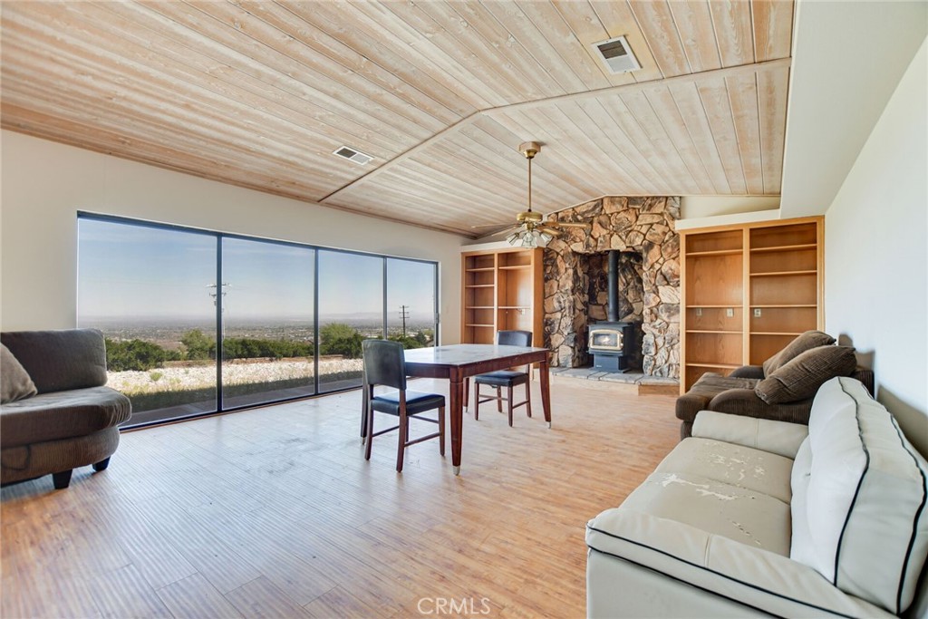 2929 Snow Line Drive Pinon Hills, CA 92372 - Photo 11 of 67 a view of a livingroom with furniture and window