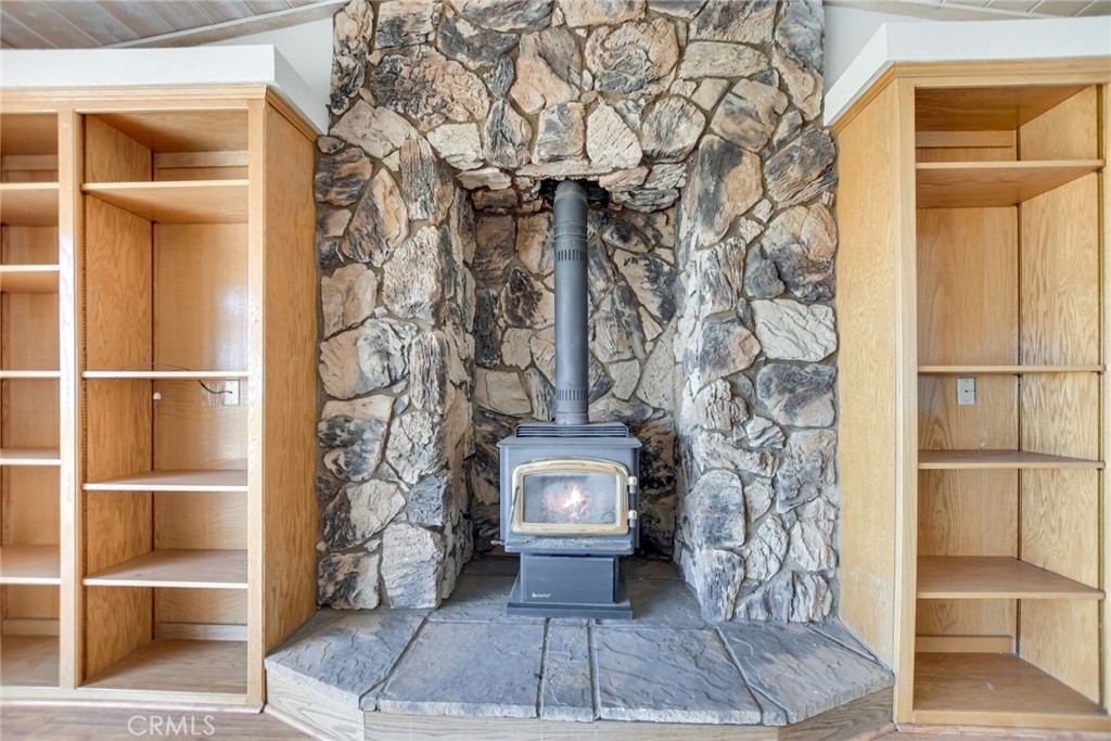 2929 Snow Line Drive Pinon Hills, CA 92372 - Photo 13 of 67 a front view of a house with a door and wooden floor