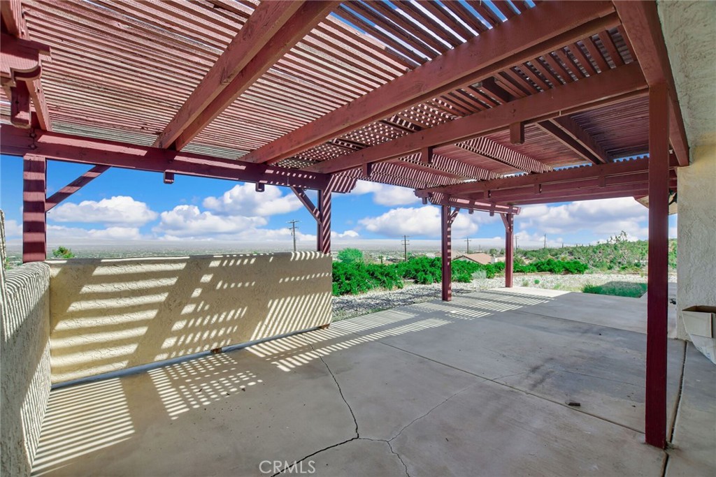 2929 Snow Line Drive Pinon Hills, CA 92372 - Photo 37 of 67 a view of a backyard with sitting area